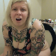 A fat, blonde girl with a lot of tattoos takes a wet, gassy-sounding shit while sitting on a toilet. Nice wet plops, too. She comments about the horrible smell. Presented in 720P HD. Over 5 minutes.
